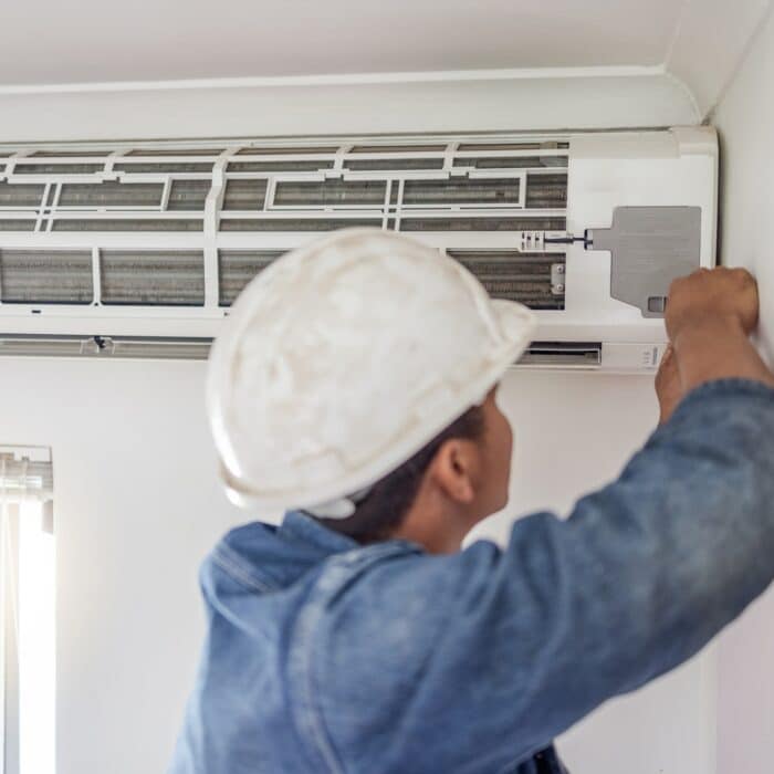 Air conditioner, ac repair and building hvac maintenance of a handyman and builder on home renovati